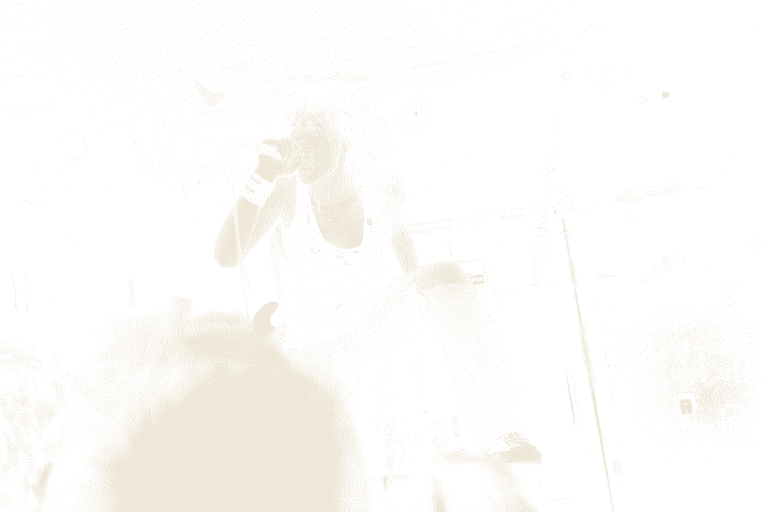 Photocopied shot of ForF mid-set, the singer up on the monitors with the room packed in below.